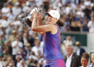 French Open 2024 Champion Iga Swiatek of Poland is holding the trophy at Roland Garros, Paris,
