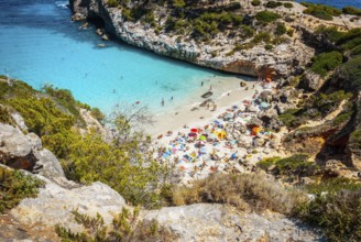 Calo des Moro, Mallorca on a sunny day with people on the beach