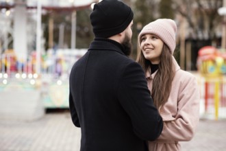 Young couple holding hands