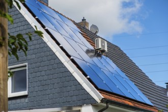 Solar panels on the roof of a detached house in Essen, Germany, Europe