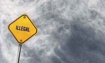 Illegal, yellow sign with cloudy sky