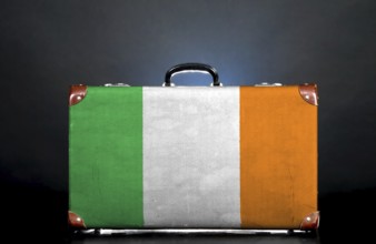 The irish flag on a suitcase for travel