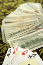 Dollar notes and poker cards, gambler tools recreation