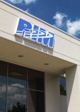 RIM sign on Research in Motion company headquarters building against blue sky. Waterloo, Ontario,
