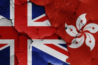 Flags of UK and Hong Kong painted on cracked wall