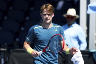 MELBOURNE, AUSTRALIA, JANUARY 11: Zizou Bergs of Belgium on his way to beating Joris De Loore of