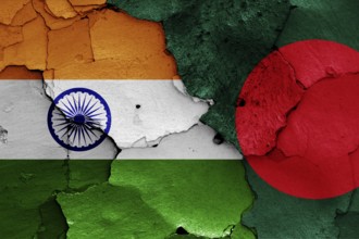 Flags of India and Bangladesh painted on cracked wall