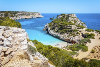 Calo des Moro, Mallorca on a sunny day with people on the beach