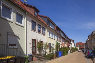 Terraced houses with rubbish bins in the city centre, residential building, Hildesheim, Lower