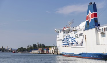 A picture of a large passenger and roll on-roll off cargo ship from Polferries docked in the Port
