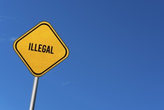 Illegal, yellow sign with blue sky