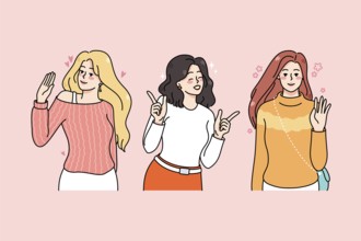 Smiling diverse young women having fun chilling out together. Happy female characters waving hand,
