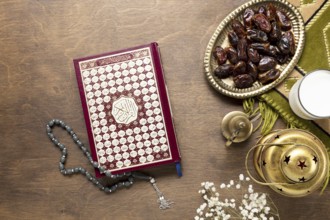 Quran prayer beads wooden table. Resolution and high quality beautiful photo