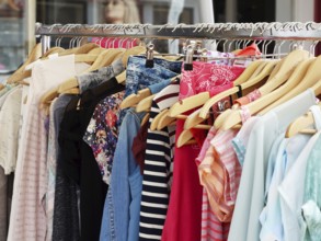 clothes rack with a selection of ladies fashion