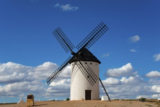 A windmill under a clear, cloudy sky, Campo de Criptana, Ciudad Real province, Castilla-La Mancha,