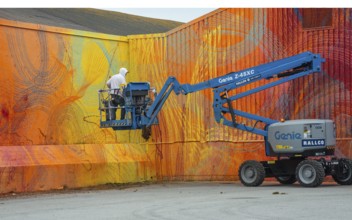 American street artist Douglas Hoekzema, also known as HOXXOH paints a wall in Ystad, Skåne County,