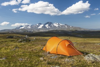 Tent with a view of the Acre Massif, Stora Sjöfallet National Park, Laponia World Heritage Site,