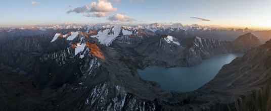 Evening mood, mountain panorama, aerial view, 4000 metre peak with glacier, mountain pass and