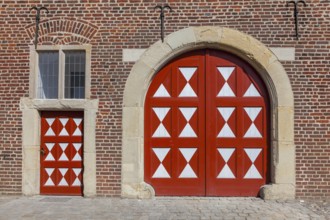 Historic moated castle, Renaissance Raesfeld Castle, façade with one Tor tor and one door, Freiheit