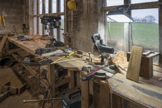 Workbench with drill stand and circular saw in a workshop, Mecklenburg-Vorpommern, Germany, Europe