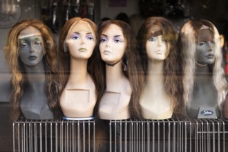 Female mannequins with hair extensions, shop window, Copenhagen, Denmark, Europe