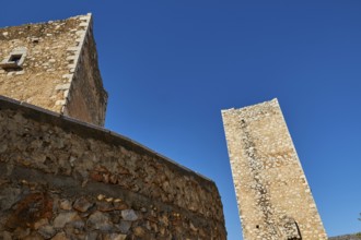 Medieval tower reaching up into a clear blue sky, Flomochori, residential tower village, Mani