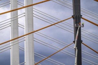 The new Rhine bridge Neuenkamp, the A40, white pillar ropes, and the old motorway bridge, which is