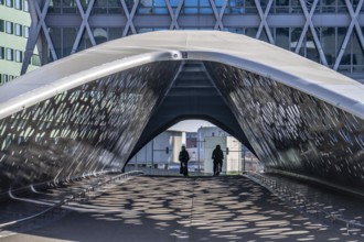 The Parkbruk, cycle and pedestrian bridge in the city centre of Antwerp, crosses a multi-lane city