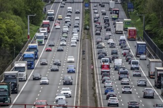 The A3 motorway, heavy traffic on 8 lanes, including the temporarily open hard shoulder, in front