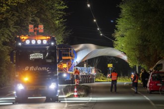 Transport of a 68 metre long, 22 tonne blade of a wind turbine, here in Schwelm, with a