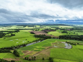 Farms and Fields over River Eden and River Eamont from a drone, Cumbria, England, United Kingdom,