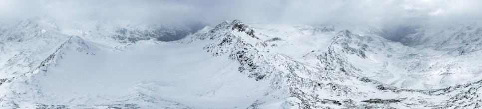 Aerial view, Snowy mountain landscape in fog, Ortler group, Trento, Italy, Europe