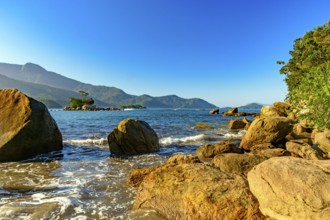Rocks on Castelhanos Beach on the island of Ilhabela in Sao Paulo coast, Castelhanos beach,