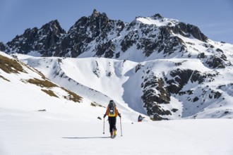 Ski tourers on the Graubünden Haute Route, Snow-covered mountains, Winter in the Albula Alps,
