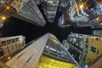 The lights of Frankfurt's banking skyline glow in the evening after sunset, Frankfurt am Main,