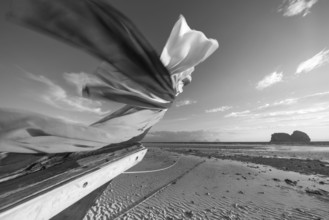 Longtail boat on the beach, at low tide, Koh Ngai Island, Andaman Sea, Satun Province, Southern