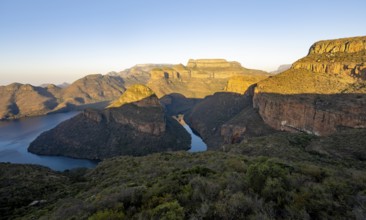 Sunset at Blyde River Canyon with Three Rondawels peak, view of canyon with Blyde River and Mesa
