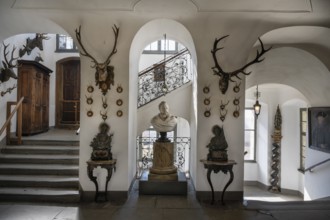 Staircase with hunting trophies and bust of the heraldist Carl Mayer von Mayerfels (1825-1883) in