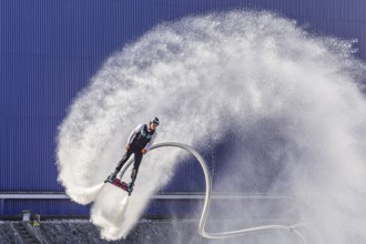 Harbour festival in Stuttgart. Spectacular jet ski and flyboard show on the Neckar. Stuttgart,