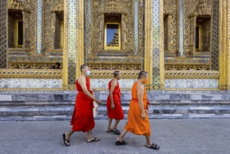 Wat Phra Kaeo temple, royal palace. Royal chapel with Buddhist monks and novices. Bangkok,