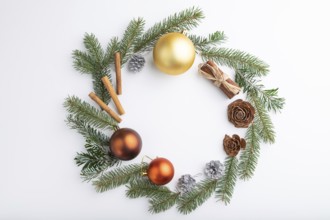 Christmas or New Year wreath composition. Decorations, balls, cones, fir and spruce branches, on