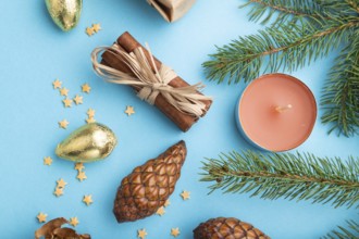 Christmas or New Year composition. Decorations, box, cinnamon, cones, fir and spruce branches, on a