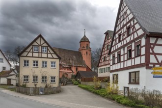 Historic half-timbered houses with the baroque church of St Vitus, built in 1464, Altenthann.