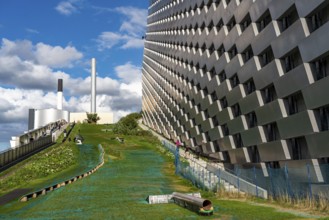 CopenHill, waste incineration plant and artificial ski slope, skiing with a view of the ski lift,