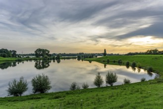 Lower Rhine landscape, reflection in the turning basin of the northern harbour of Walsum, view to