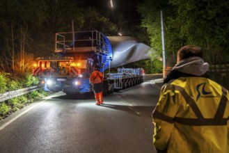 Transport of a 68 metre long, 22 tonne blade of a wind turbine, here in Schwelm, with a