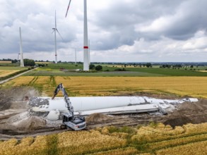 Demolished tower of a 20 year old wind turbine, in the Werl wind farm, 5 old Enercon E-66 turbines
