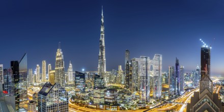 Burj Khalifa skyline tallest building in the world panorama from above in Downtown at night in