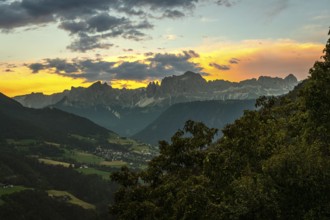 Stunning sunset over the italian dolomites, creating a breathtaking panorama of vibrant colors,