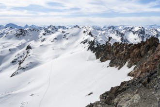 Mountain panorama with view of the Scalettahorn summit, ascent to Piz Grialetsch in winter, Grisons